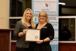 2012 Elementary Presidential Award Finalist Annette Huet receives a certificate from SDE Science Director Tiffany Neill