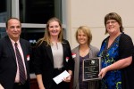 Outstanding College/ University Awardee Dr. Julie Angle is pictures with Saeed Sarani, her nominator Jenny Ortman, and OSTA President Tina Rogers