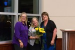 Retiring OSTA Past-President Beth Allan receives a bouquet from, OSTA President Tina Rogers and President-elect Joyce Cheatham